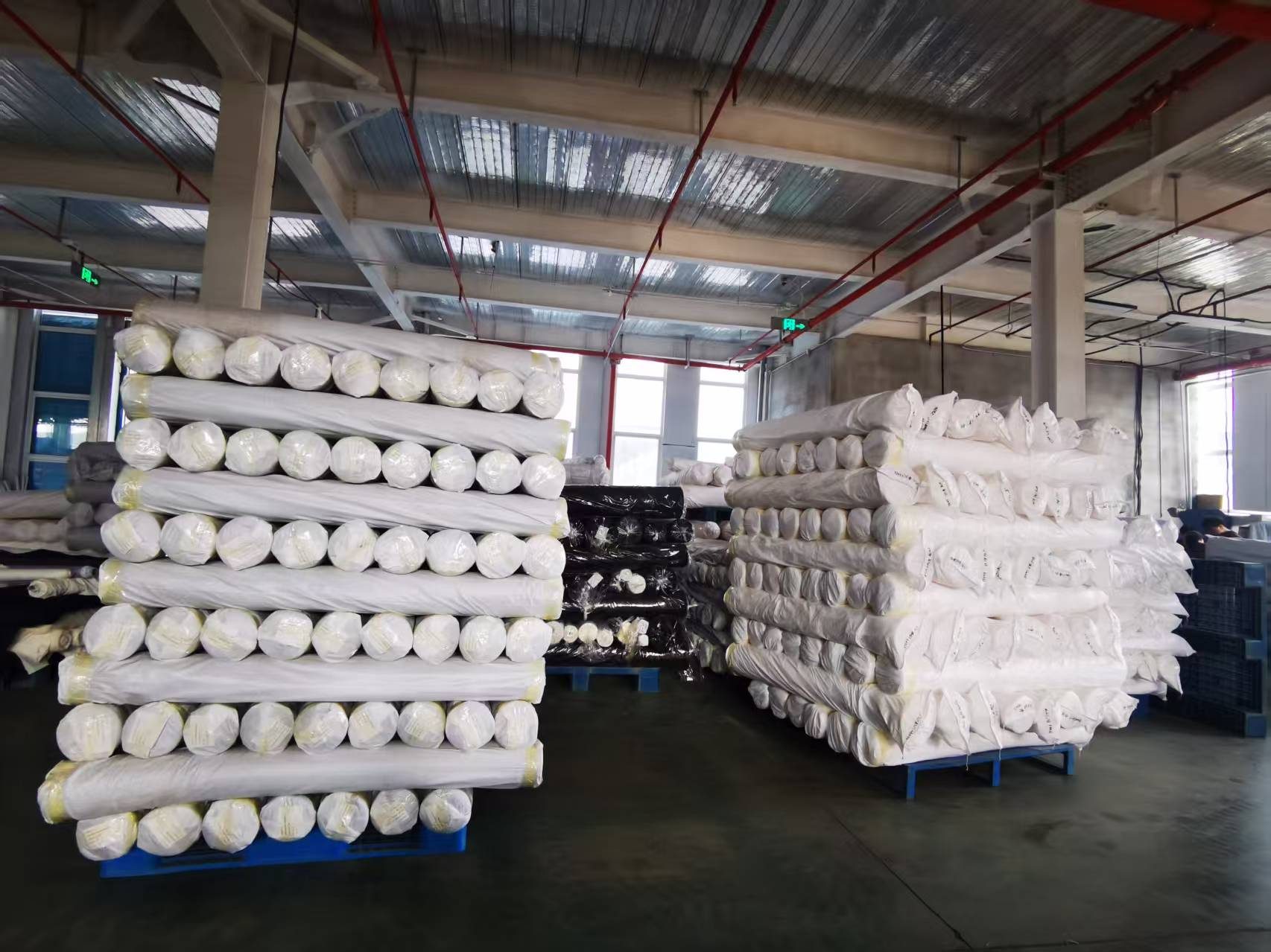 Packed rolls on pallets